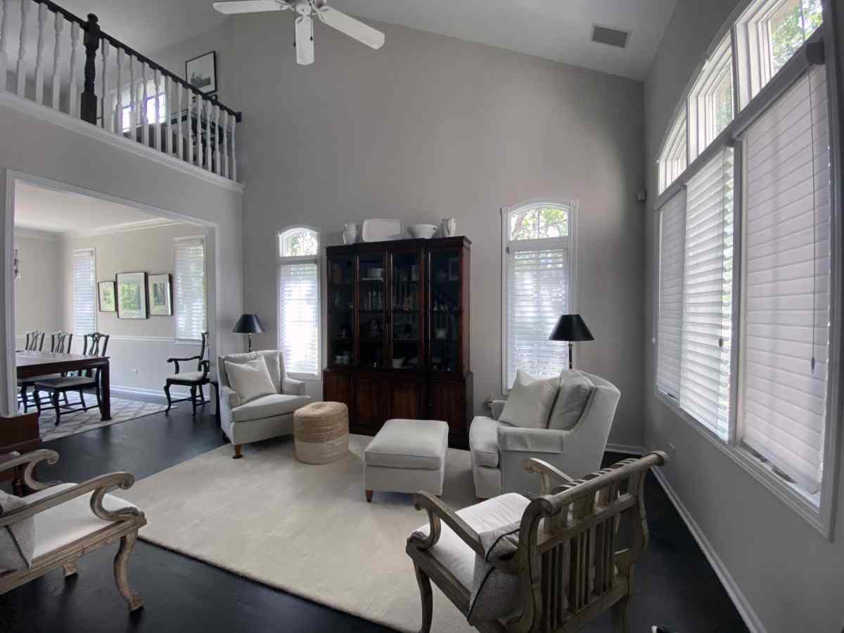 Our Blog 10 Contemporary living room with sofa, coffee table, and sheer shades near Chicagoland, IL.