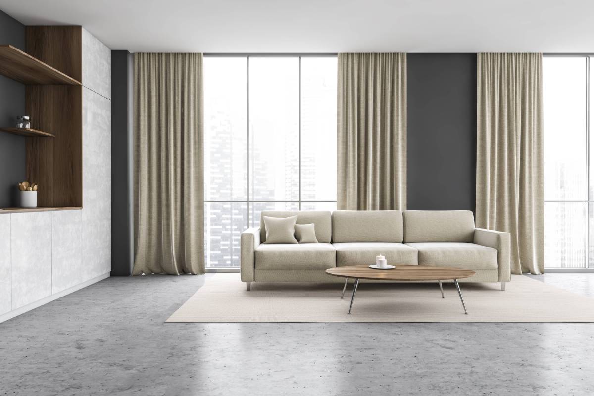 Our Blog 6 Custom drapery covering floor to ceiling windows in a living room at Beyond Shades near Chicagoland, IL